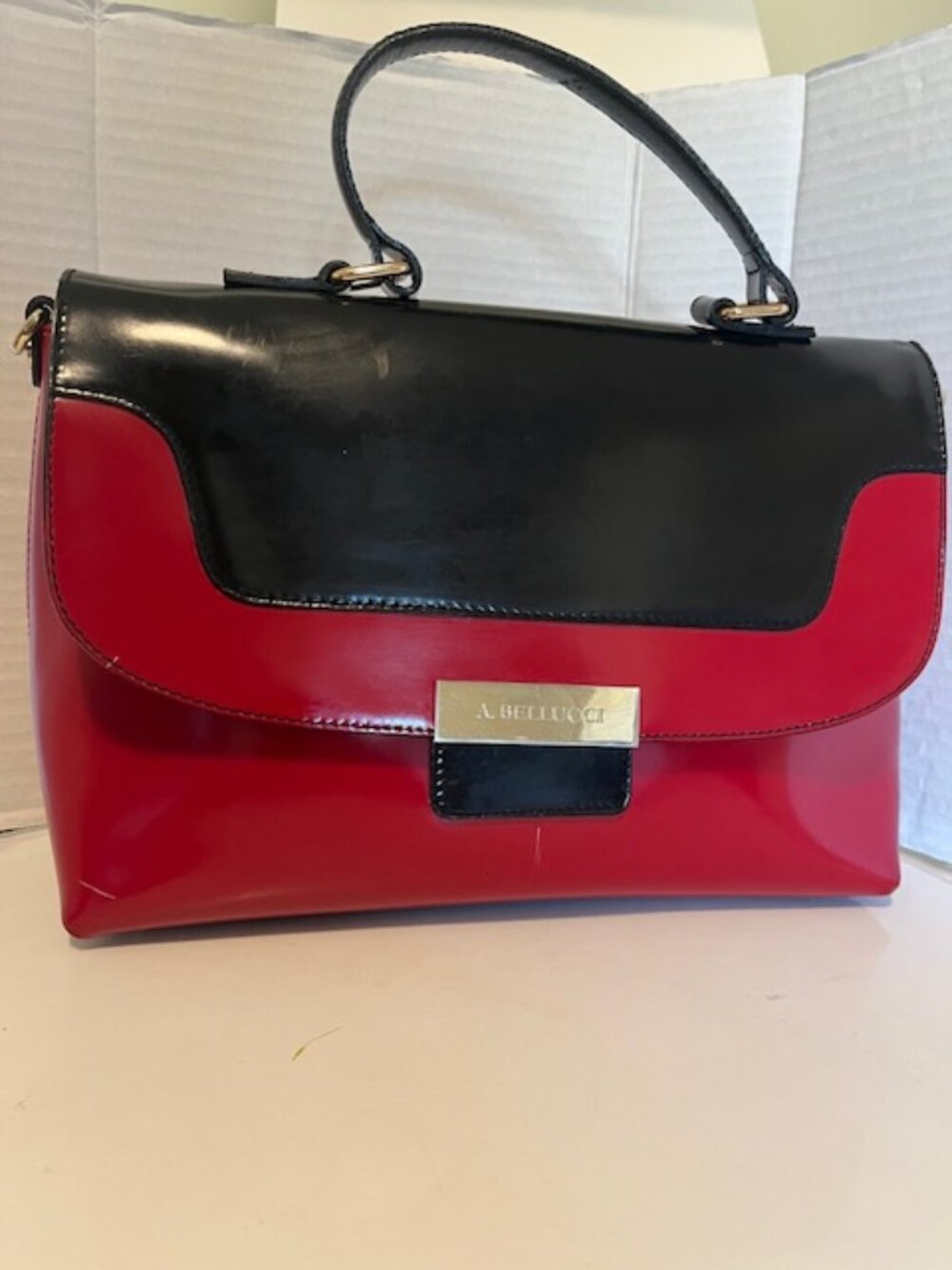 A Bellucci leather satchel bag.